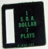 1 S.B.A. Dollar 7 Plays C-826-122 - Bally Coin Plate